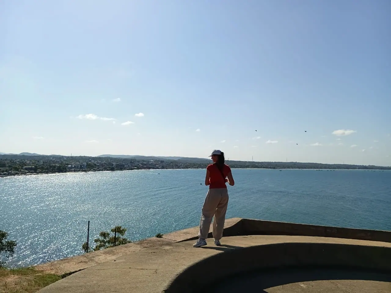 A guest at a viewpoint above the northern lagoon
