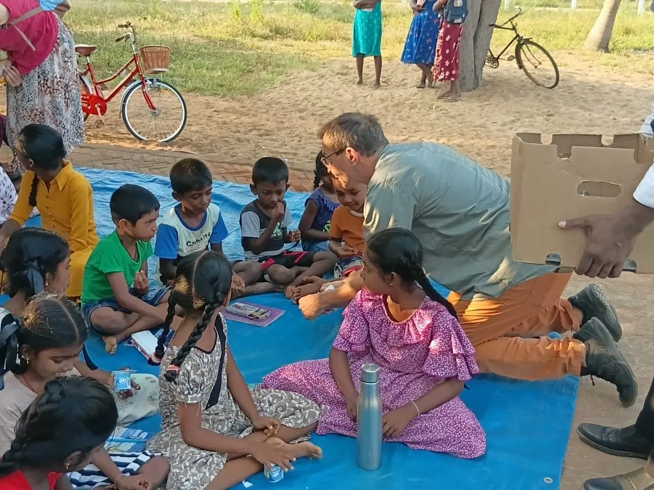 A community visit arranged as part of a Kings Holidays tour