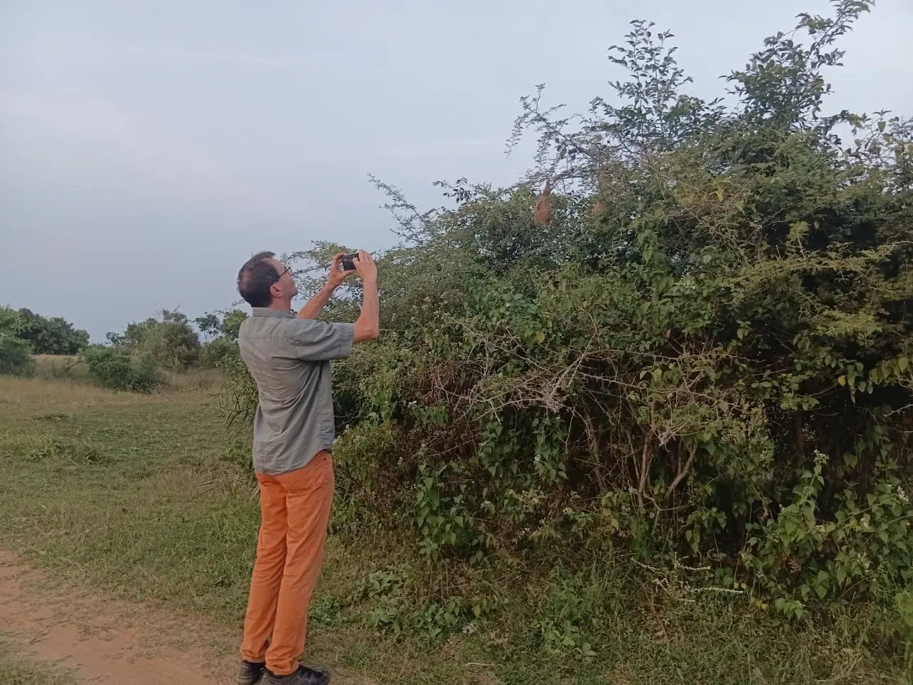 A guest pausing for water on a guided nature walk