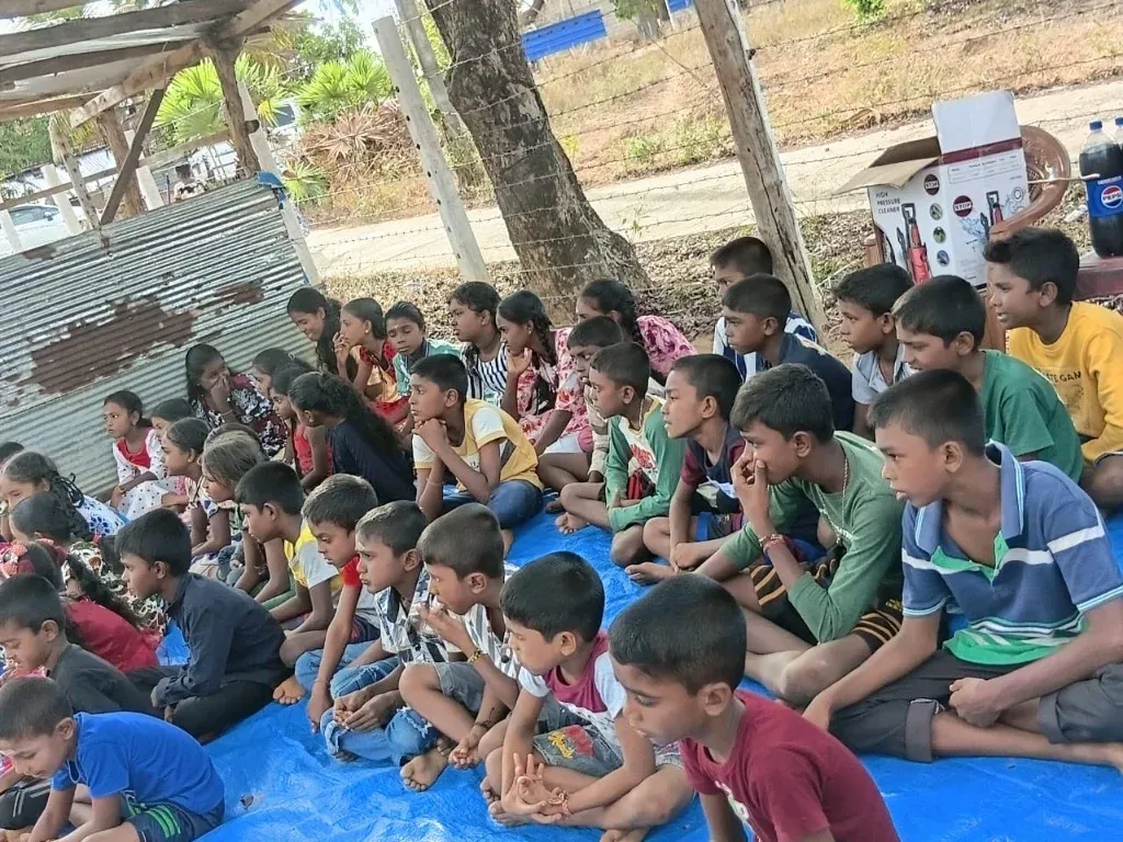 Local Sri Lankan children gathered during a community support initiative