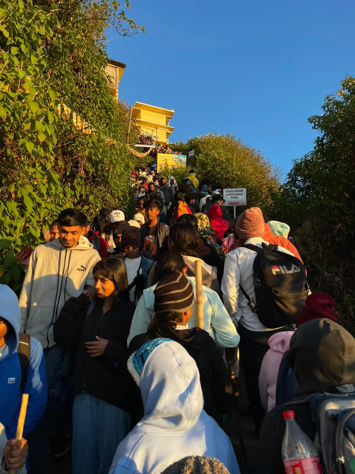 Village school children gathered for a visit
